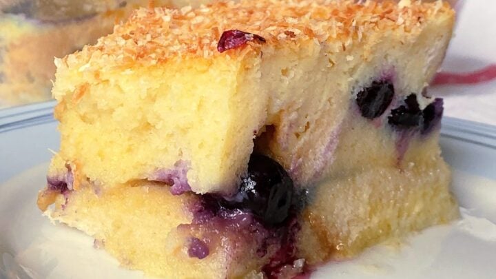 Blueberry and Coconut Bread and Butter Pudding. A luxurious version of a French Toast casserole, with a rich, creamy coconut egg custard and a generous sprinkling of fresh blueberries throughout. Delicious served warm fresh from the oven