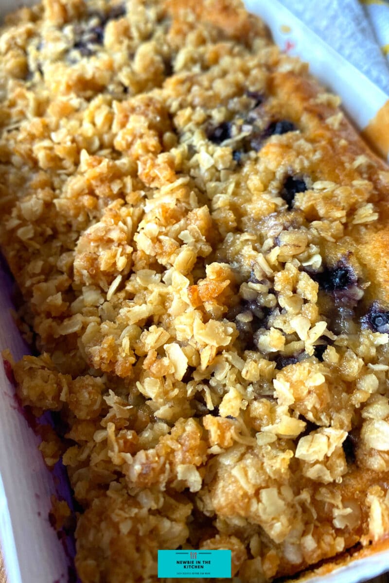 Easy Blueberry and Lemon Crumble Cake. Deliciously soft & moist cake packed with blueberries & a hint of lemon. Topped with a crumble topping. Easiest simple cake recipe ever!