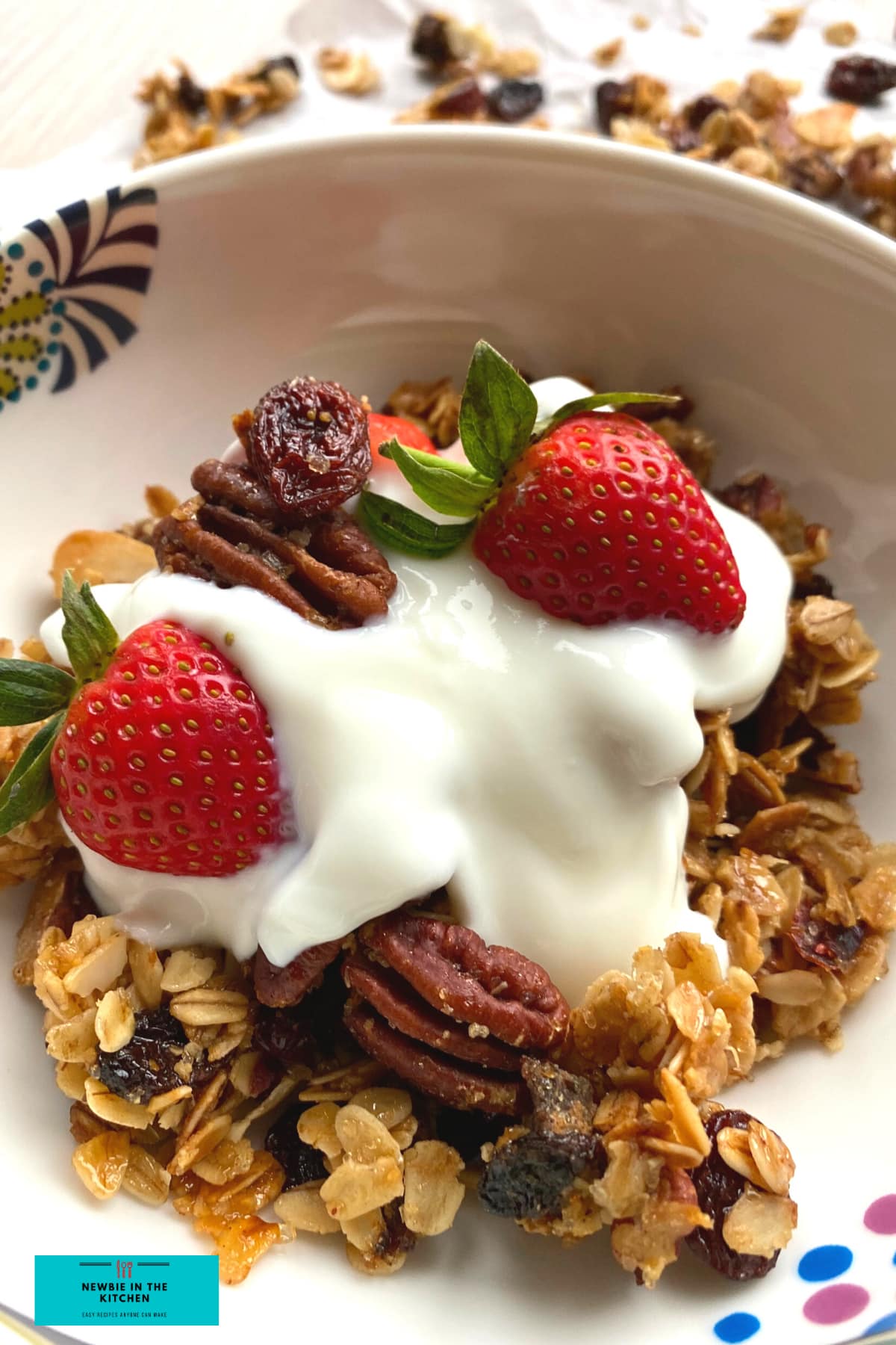 Easy Homemade Pecan Honey Granola. An easy recipe for how to make your own homemade granola. A mix of honey, nuts, and fruit make this a great start to your day. Delicious served for breakfast with yogurt and fresh fruit