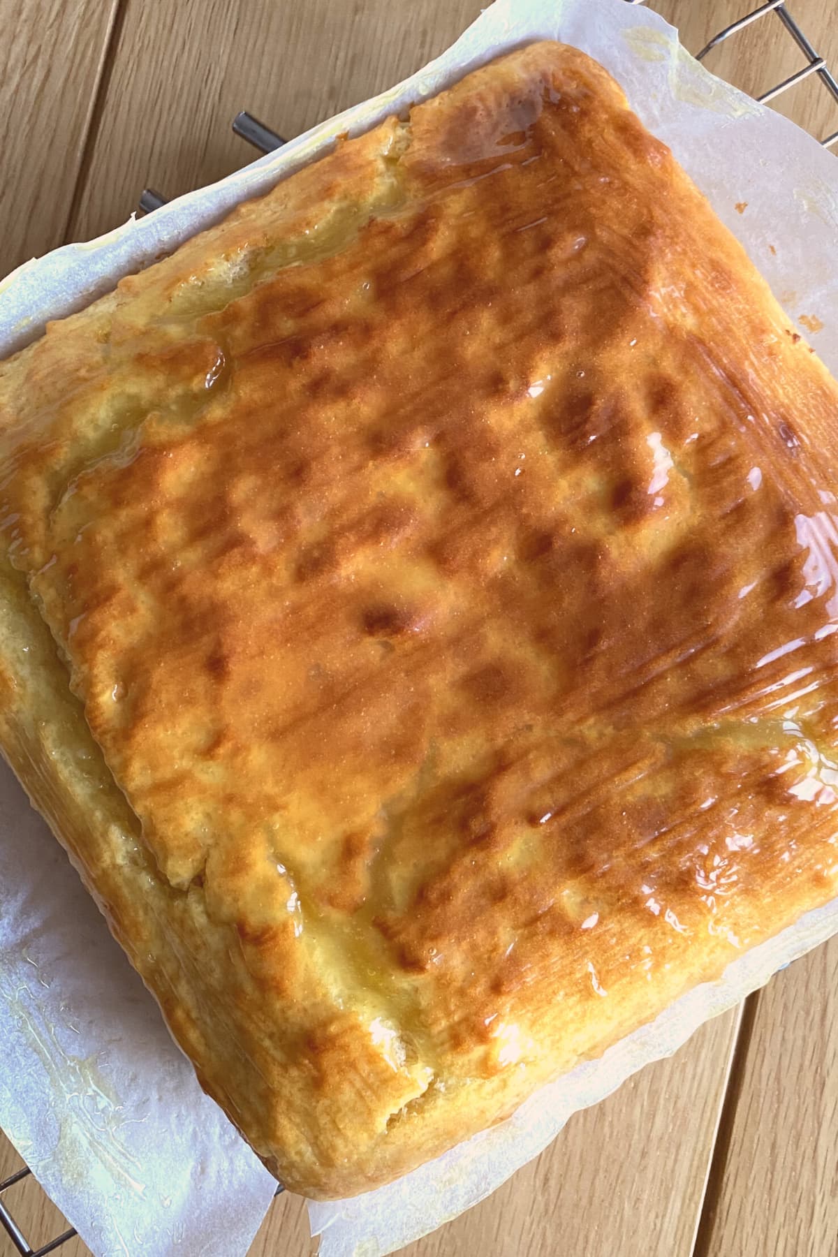 Easy Lemon French Yogurt Cake, on cooling rack