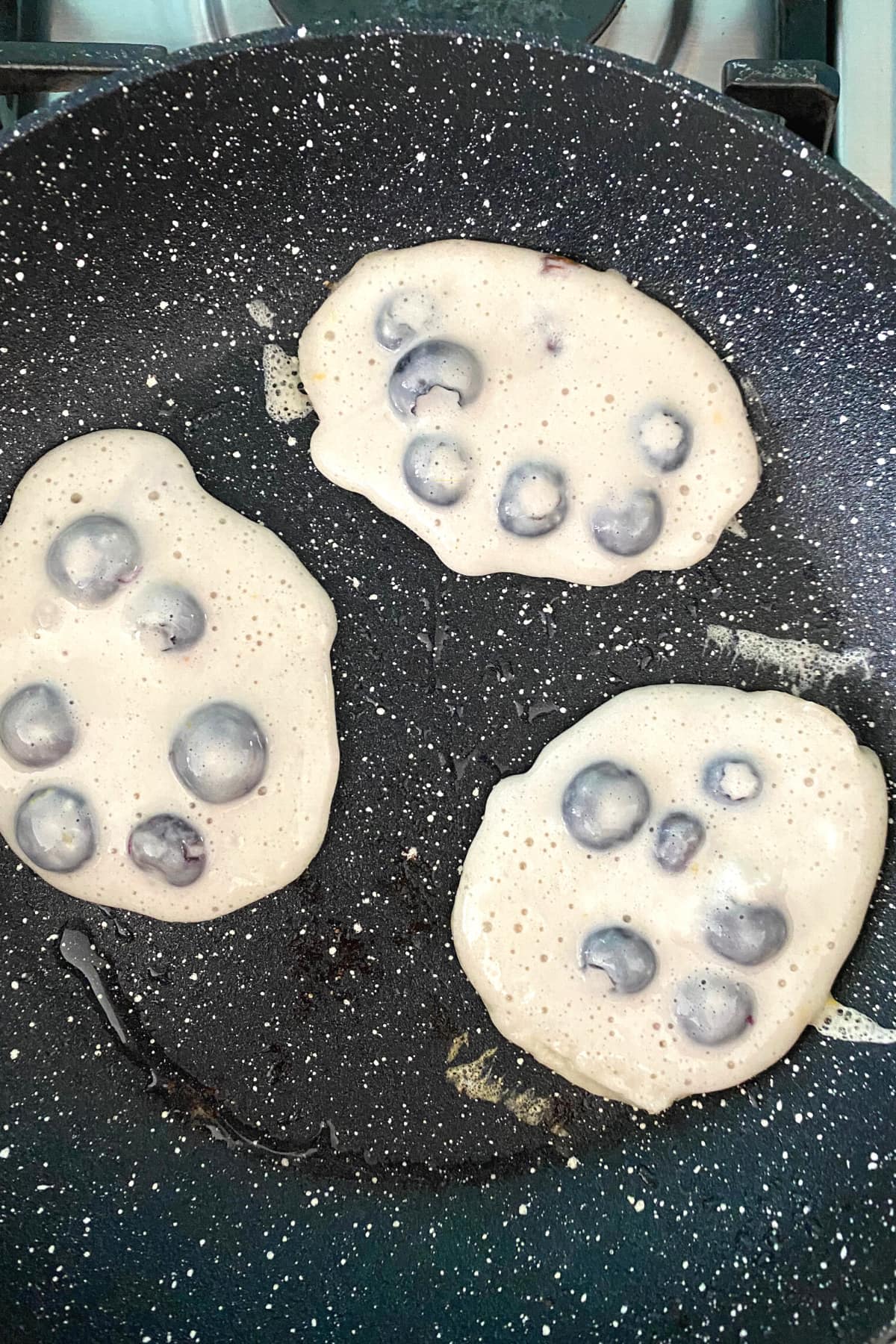 Fluffy Blueberry and Lemon Pancakes, in pan