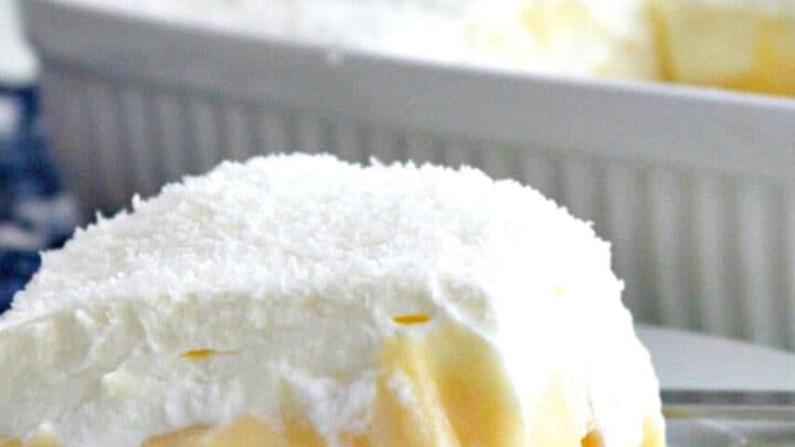 Easy Coconut and Pineapple Dessert. Layers of creamy homemade coconut pudding between pineapple on a bed of pineapple-infused lady's fingers and covered with a delicious whipped cream topping