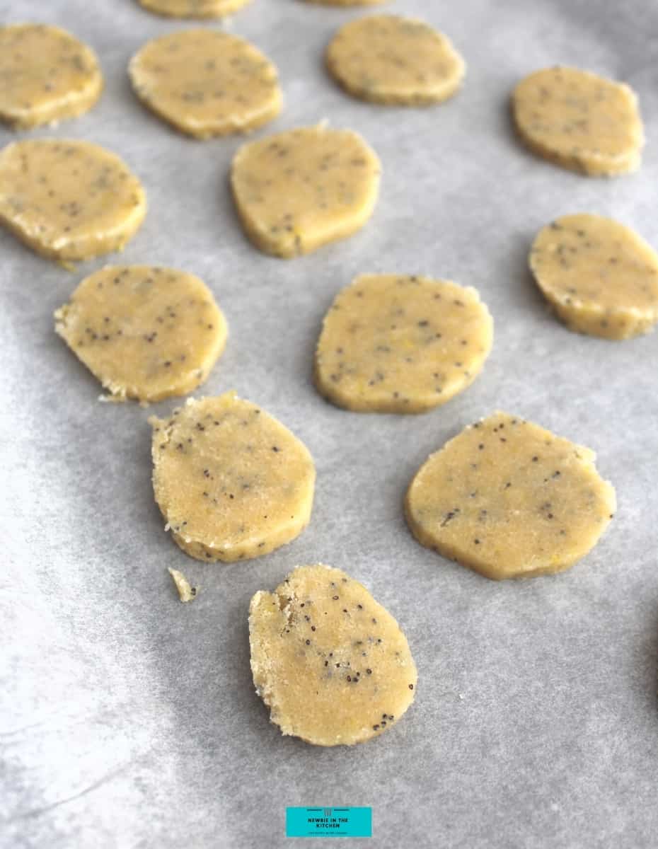 Lemon and Poppyseed Thins, cookie dough spaced on baking sheet